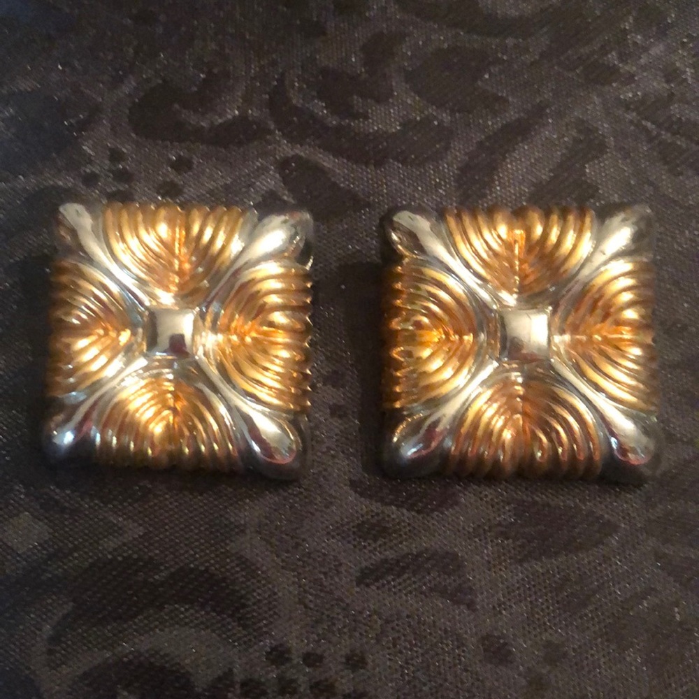 Women’s gold and silver toned clip earrings